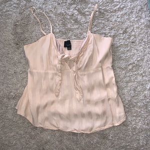 A spaghetti strap cream tank! Ties is the front.